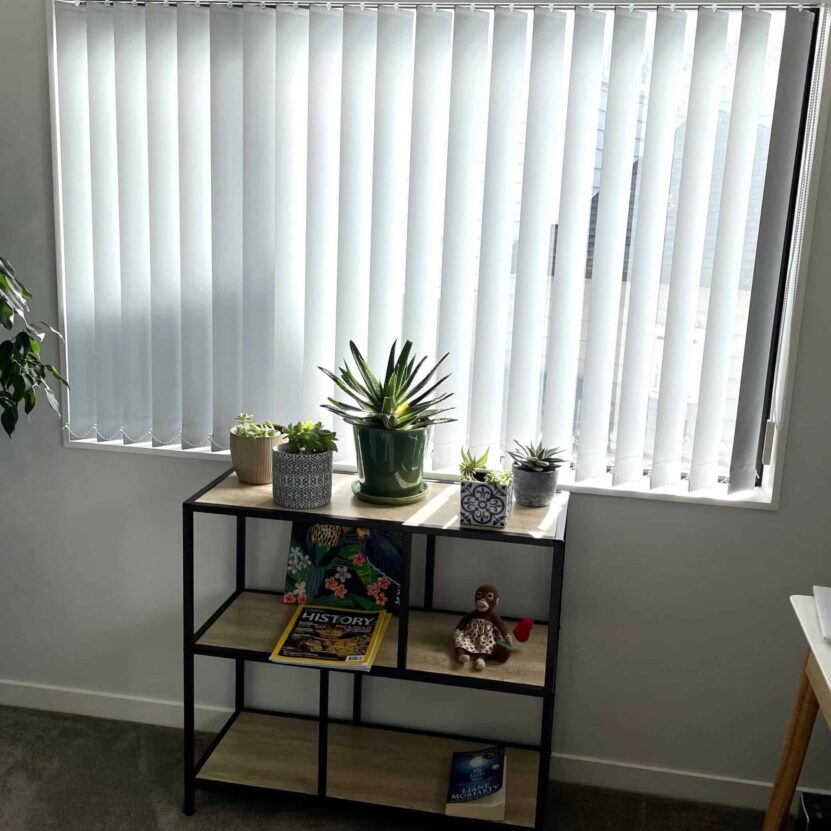 Blockout vertical blinds in a bedroom