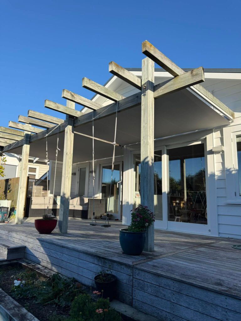 Mesh Omni blinds under pergola in Sandringham